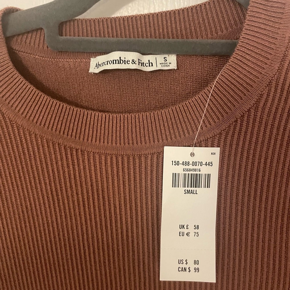 New With Tags Long Sleeve bodysuit